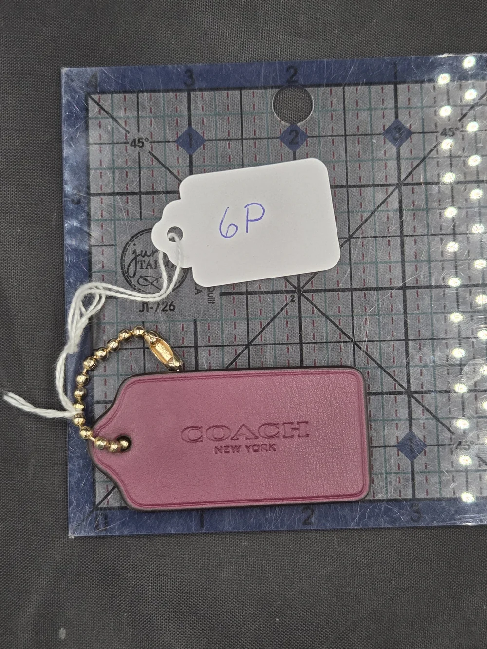 Coach Maroon Leather Bag Tag with Embossed Gold Tone Chain